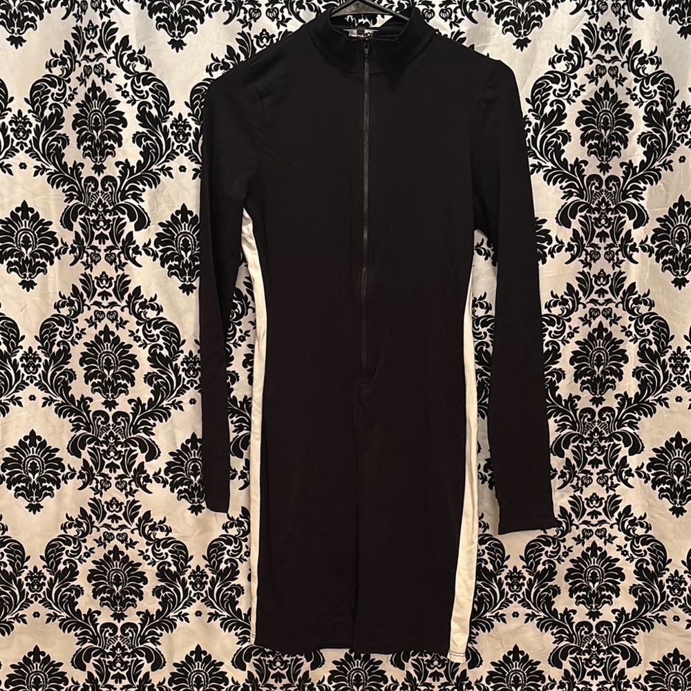 Fashion Nova Black and White Romper Sleek Design